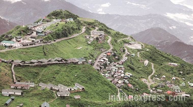 Near border standoff, a village opens its homes to a new future
